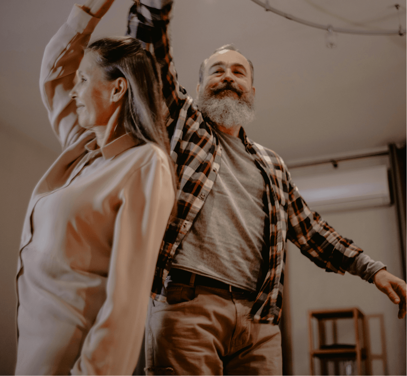 Older couple dancing, representing mobility and quality-of-life goals